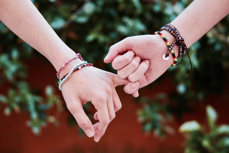 Hands joining in friendship